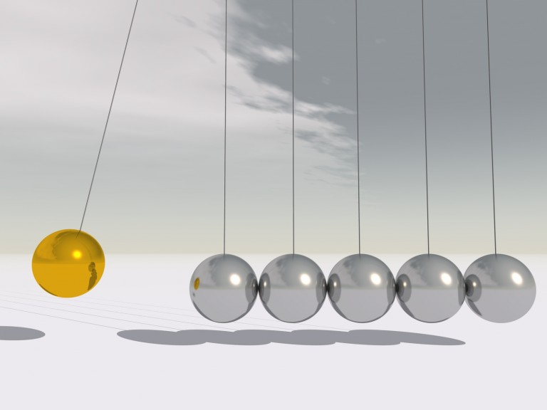 Concept or conceptual 3D silver and gold sphere pendulum over sky background